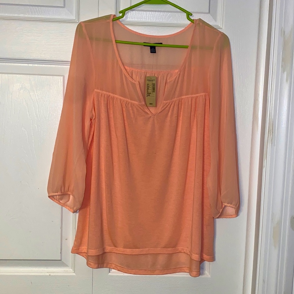 NEW women’s size medium American Eagle long sleeve blouse.